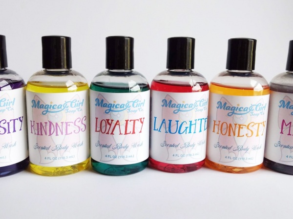A variety of colorful bottles of body wash.