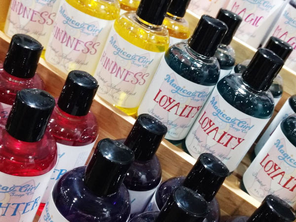 A variety of colorful bottles of body wash.